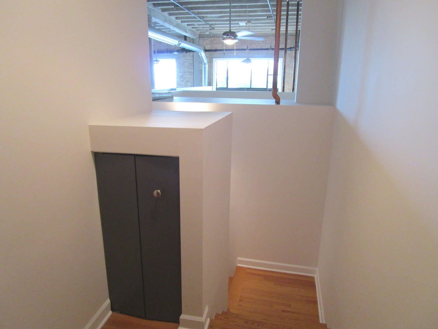 2545 South Dearborn Street, Unit 608 Chicago, IL 60616 - Photo 23 of 28 a room with window and entrance
