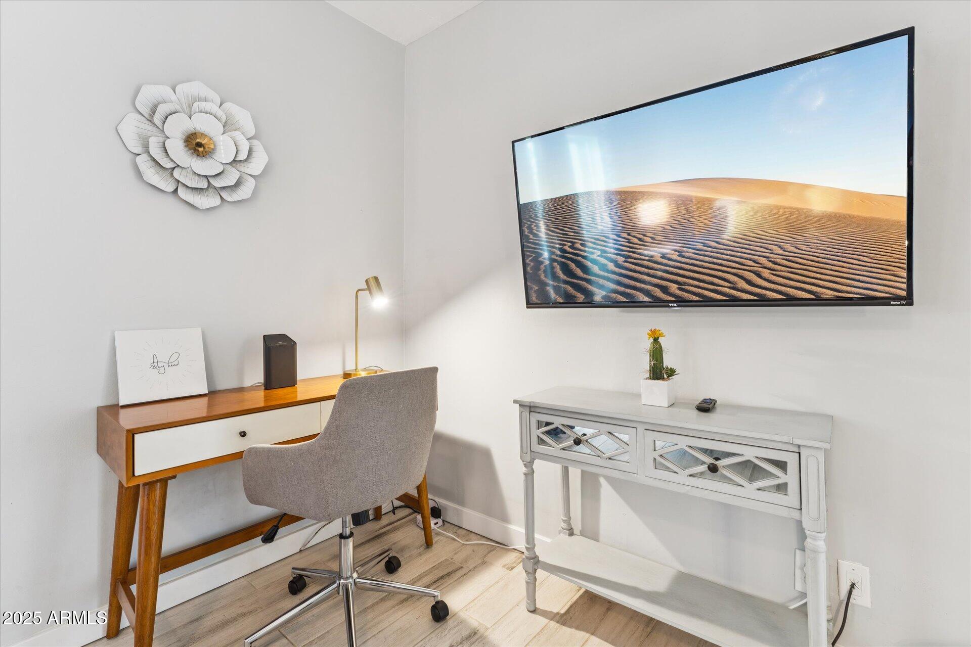 3242 East Camelback Road, Unit 105 Phoenix, AZ 85018 - Photo 16 of 24 a room with a view of gym equipment