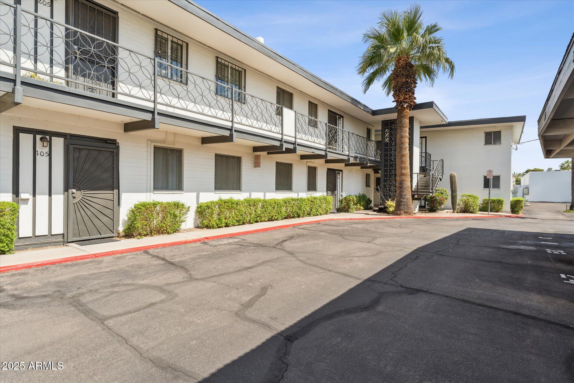 3242 East Camelback Road, Unit 105 Phoenix, AZ 85018 - Photo 2 of 24 a front view of a building
