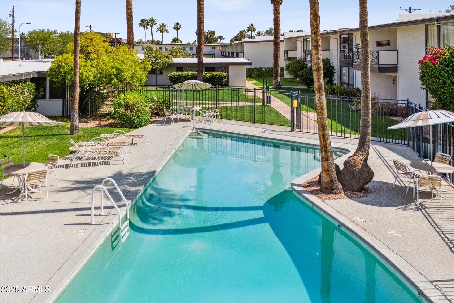 3242 East Camelback Road, Unit 105 Phoenix, AZ 85018 - Photo 23 of 24 a view of a lake from a balcony