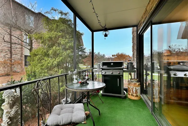 a view of a porch with furniture