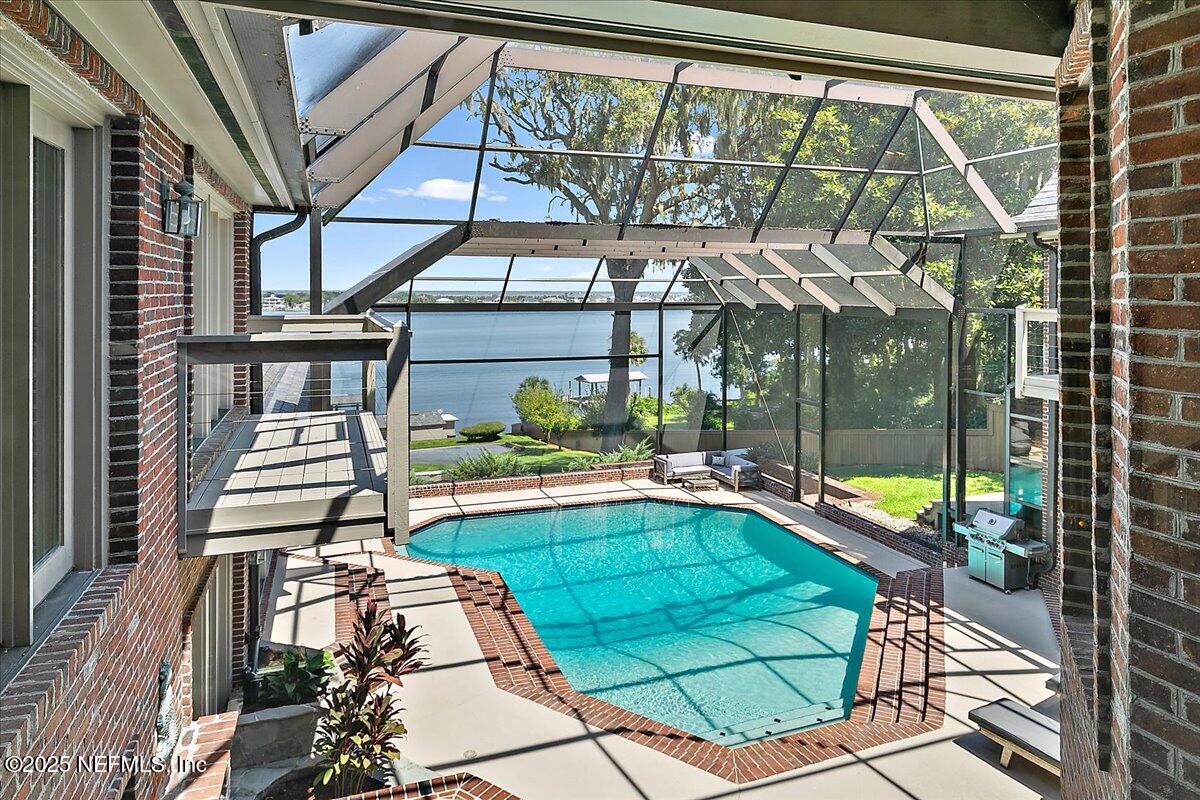 12827 Fort Caroline Road Jacksonville, FL 32225 - Photo 27 of 42 a view of swimming pool with a patio