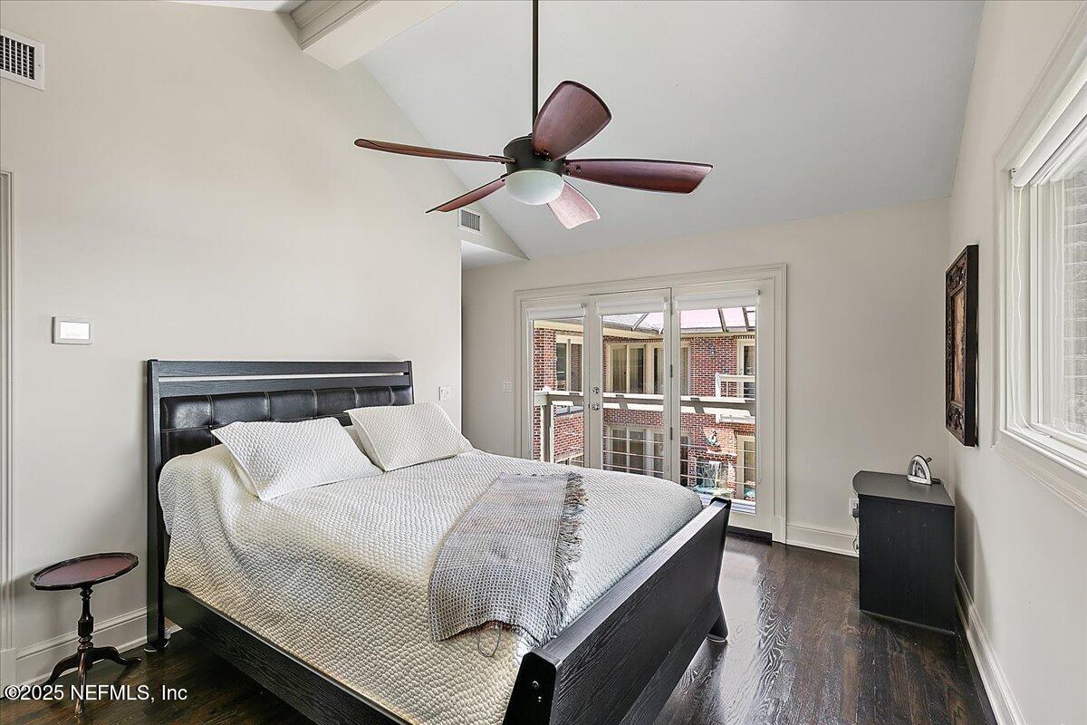 12827 Fort Caroline Road Jacksonville, FL 32225 - Photo 30 of 42 a bedroom with a bed and a large mirror