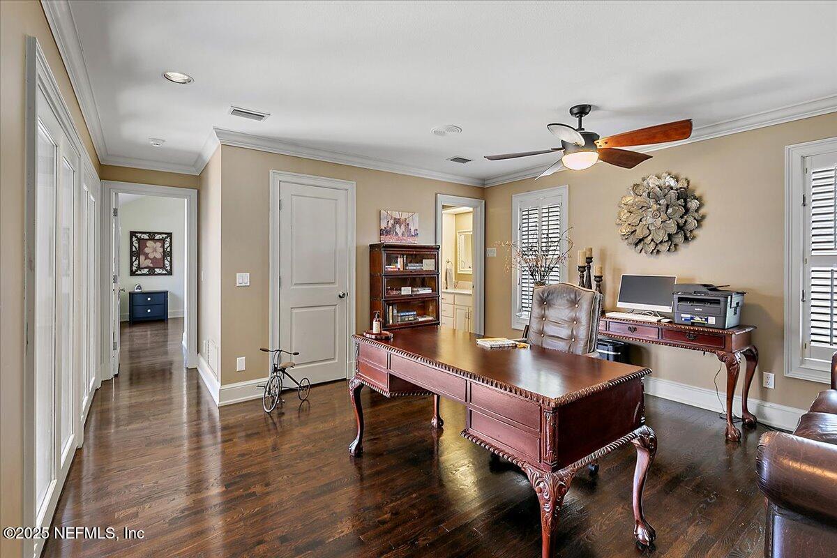 12827 Fort Caroline Road Jacksonville, FL 32225 - Photo 31 of 42 a room with furniture and wooden floor