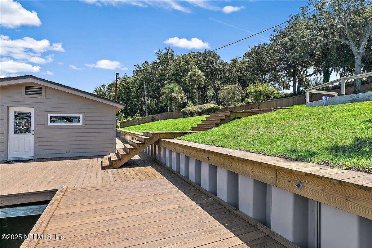 12827 Fort Caroline Road Jacksonville, FL 32225 - Photo 34 of 42 a view of a house with a yard