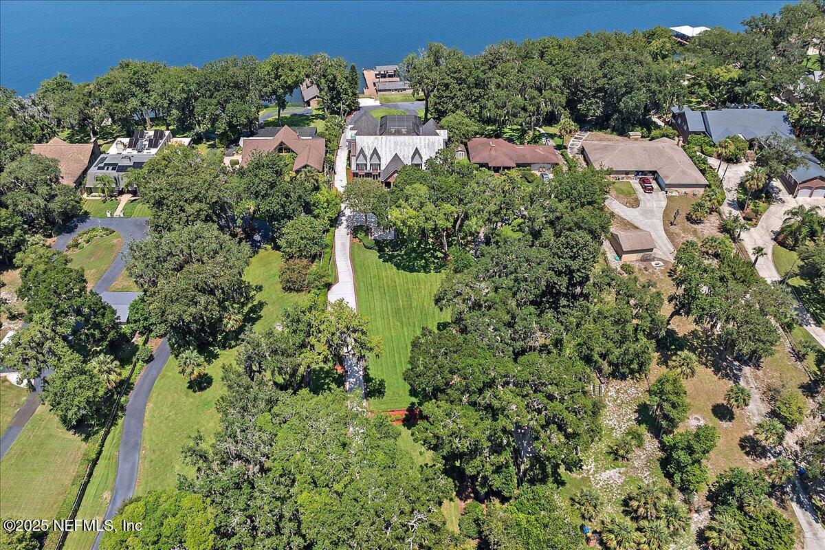 12827 Fort Caroline Road Jacksonville, FL 32225 - Photo 41 of 42 an aerial view of residential house with outdoor space and trees all around