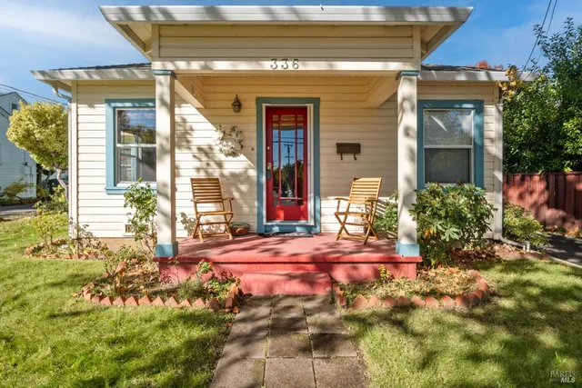 a front view of a house with a yard