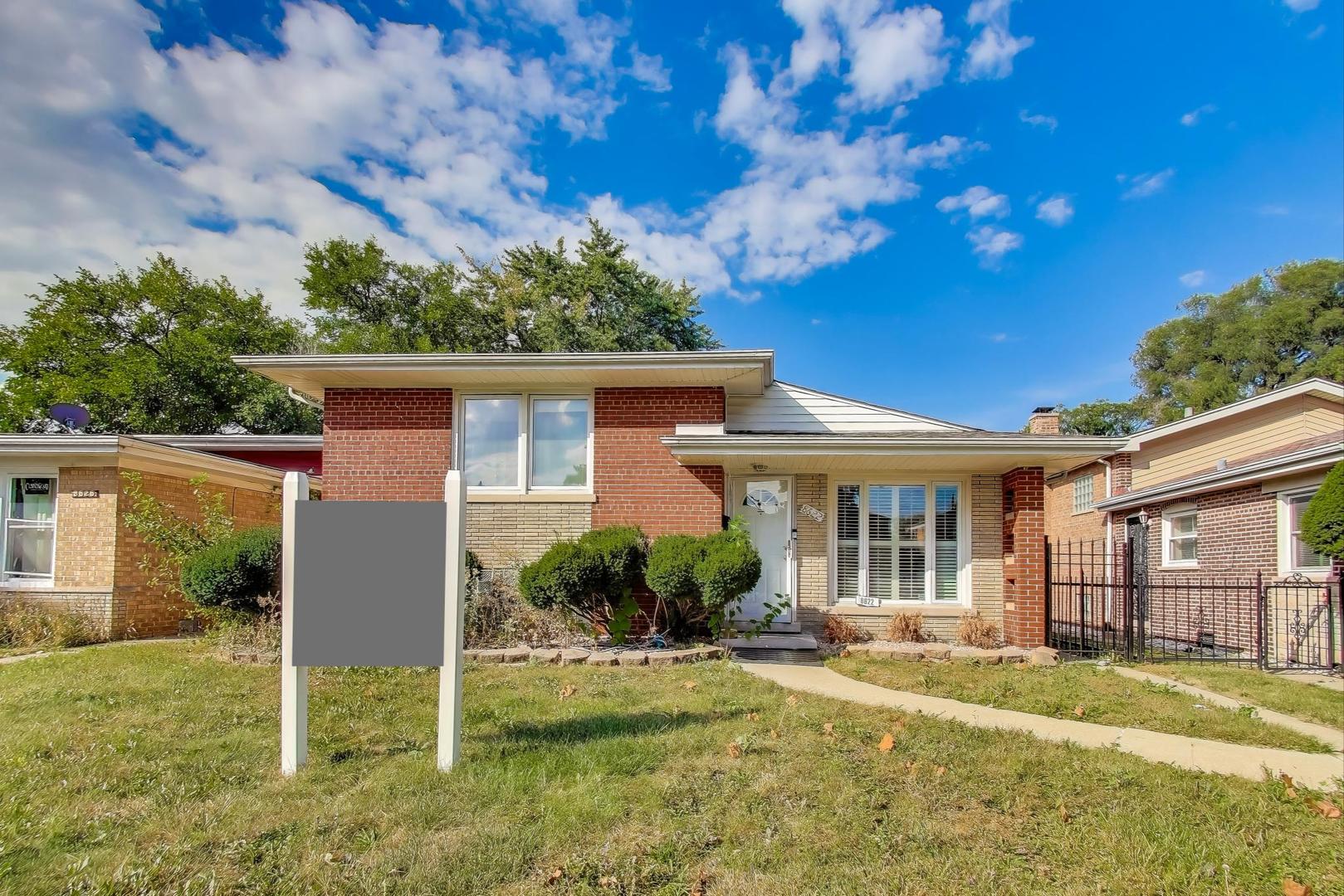 8622 South Michigan Avenue Chicago, IL 60619 - Photo 1 of 20 a view of a house with backyard and sitting area