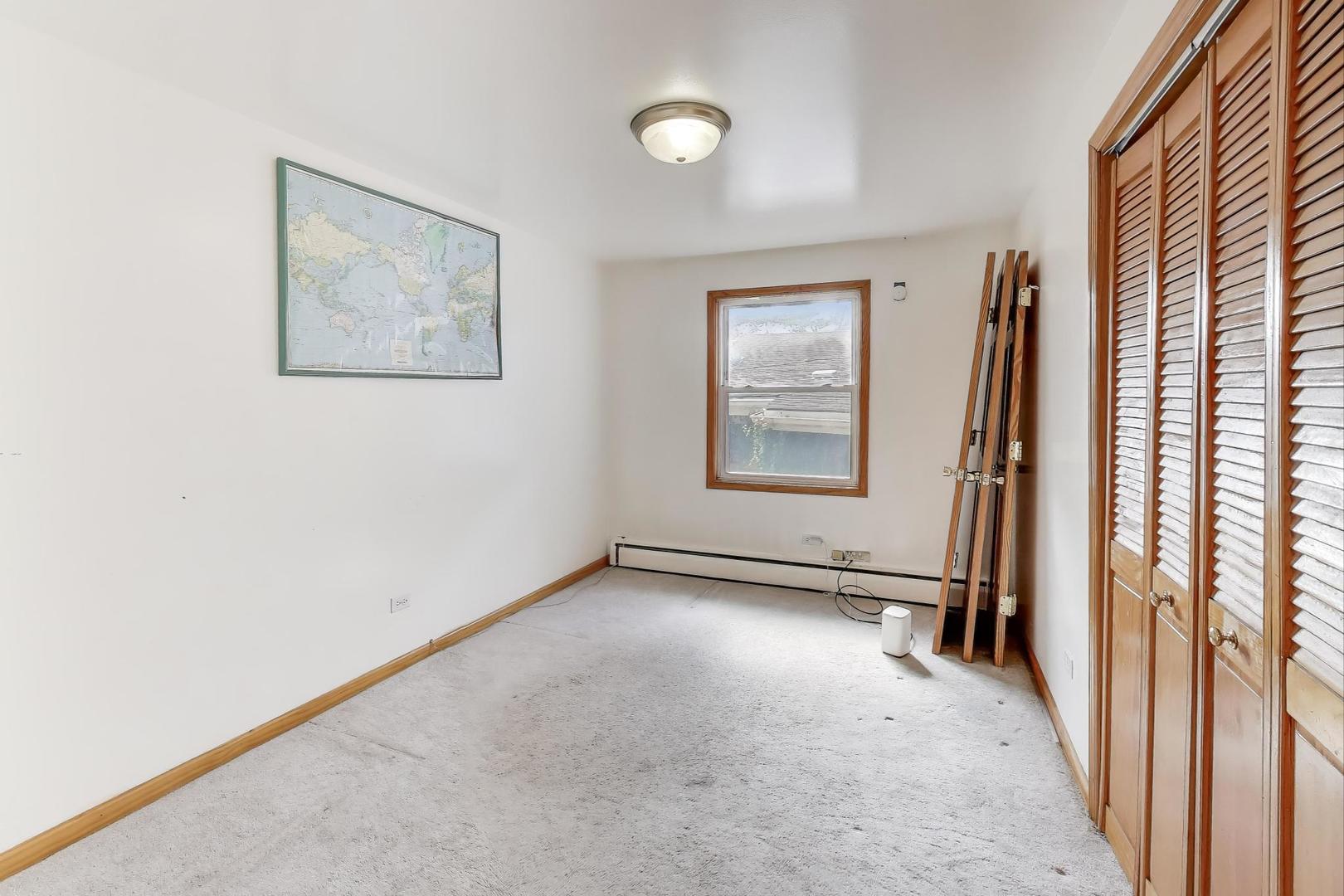 8622 South Michigan Avenue Chicago, IL 60619 - Photo 13 of 20 an empty room with windows