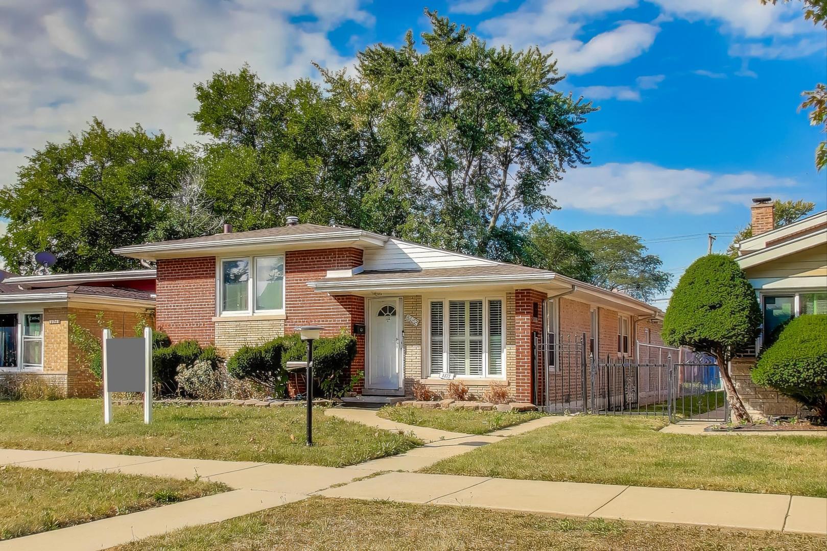 8622 South Michigan Avenue Chicago, IL 60619 - Photo 2 of 20 a view of a house with a garden