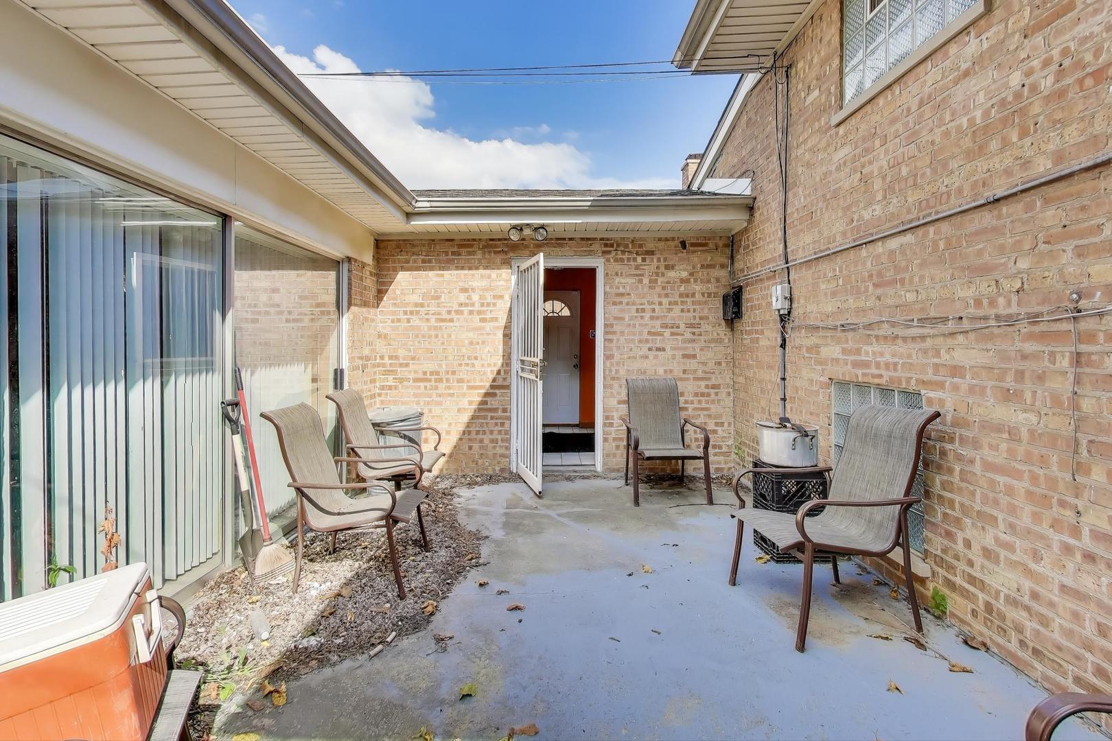 8622 South Michigan Avenue Chicago, IL 60619 - Photo 8 of 20 a view of two chairs in the balcony