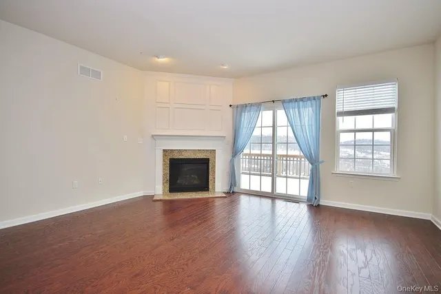 a view of balcony with furniture