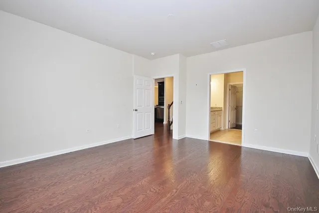 a bathroom with a shower and a sink