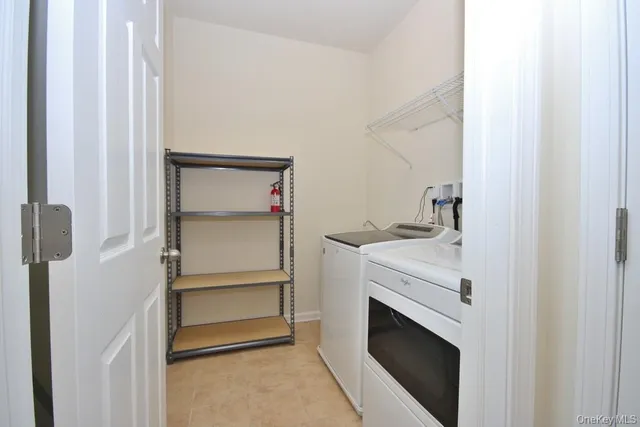 an empty room with a mirror