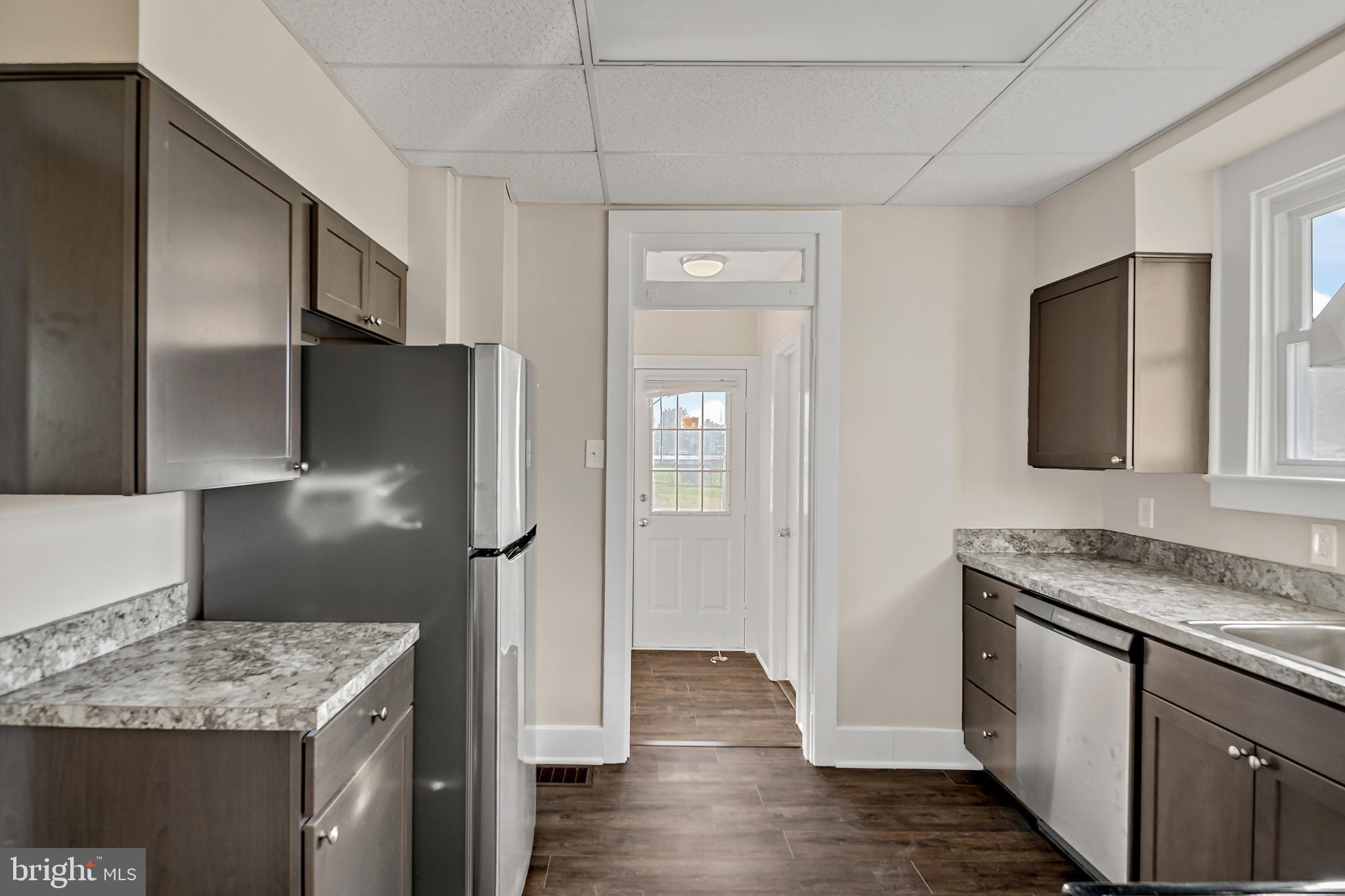 206 Hershey Road Hummelstown, PA 17036 - Photo 10 of 26 a kitchen with a sink and a refrigerator