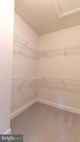 a view of a room with racks on the wall