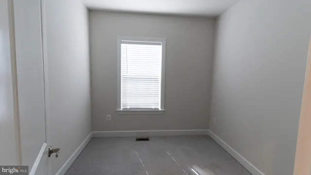 a view of a small space with a window