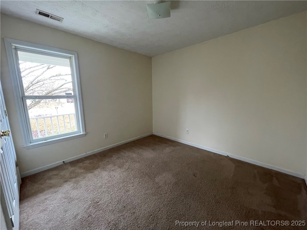 177 Deep Creek Lane Raeford, NC 28376 - Photo 15 of 28 an empty room with a window