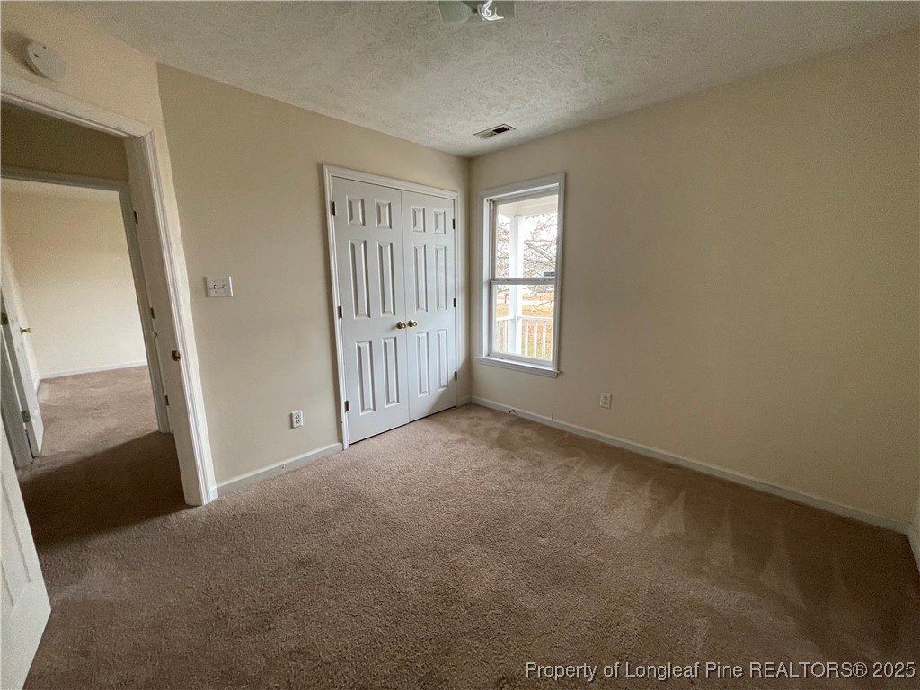 177 Deep Creek Lane Raeford, NC 28376 - Photo 16 of 28 a view of empty room with window