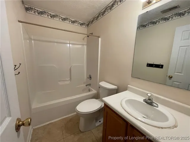 a view of small space with racks on the wall