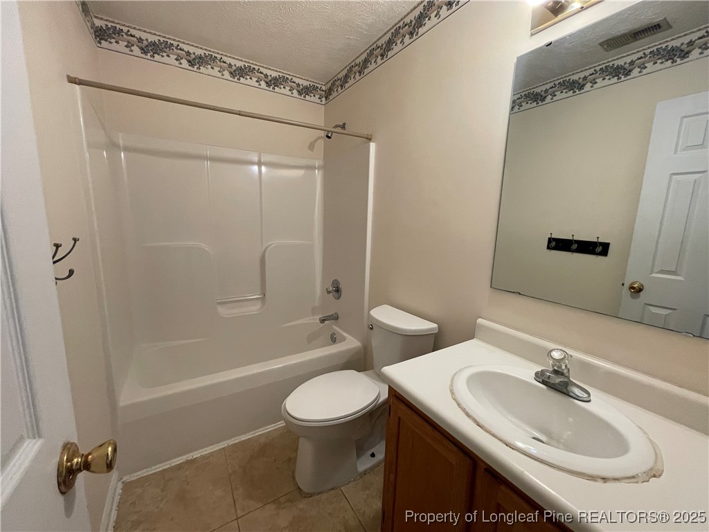 177 Deep Creek Lane Raeford, NC 28376 - Photo 17 of 28 a bathroom with a sink toilet and shower