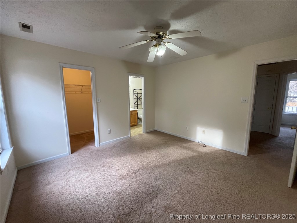 177 Deep Creek Lane Raeford, NC 28376 - Photo 20 of 28 a view of an empty room with a fan