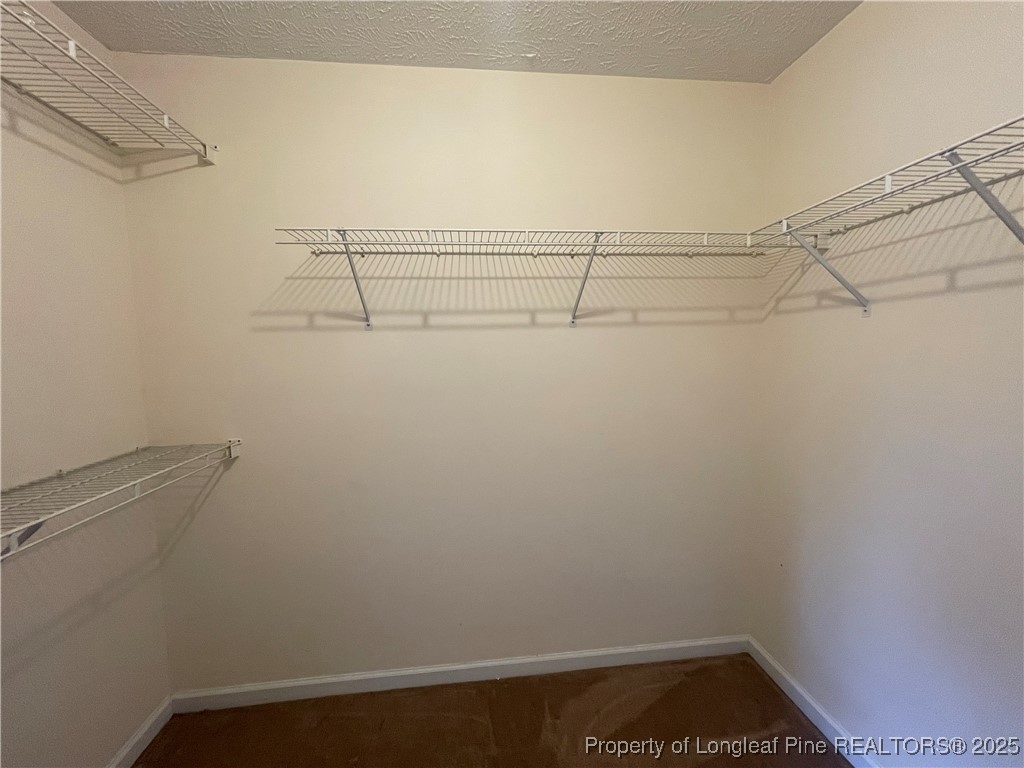 177 Deep Creek Lane Raeford, NC 28376 - Photo 22 of 28 a view of small space with racks on the wall