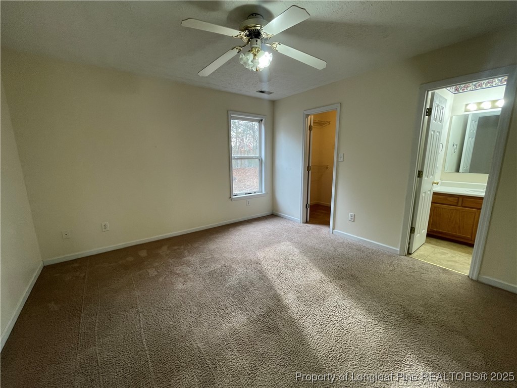 177 Deep Creek Lane Raeford, NC 28376 - Photo 27 of 28 a view of a livingroom with a ceiling fan and window