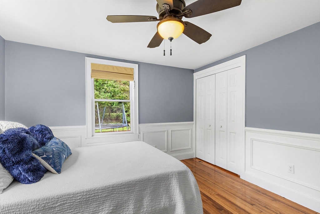 61 Pine Ridge Drive Franklin, MA 02038 - Photo 21 of 41 a bedroom with a large bed and a large window