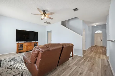 a white bath tub sitting next to a window