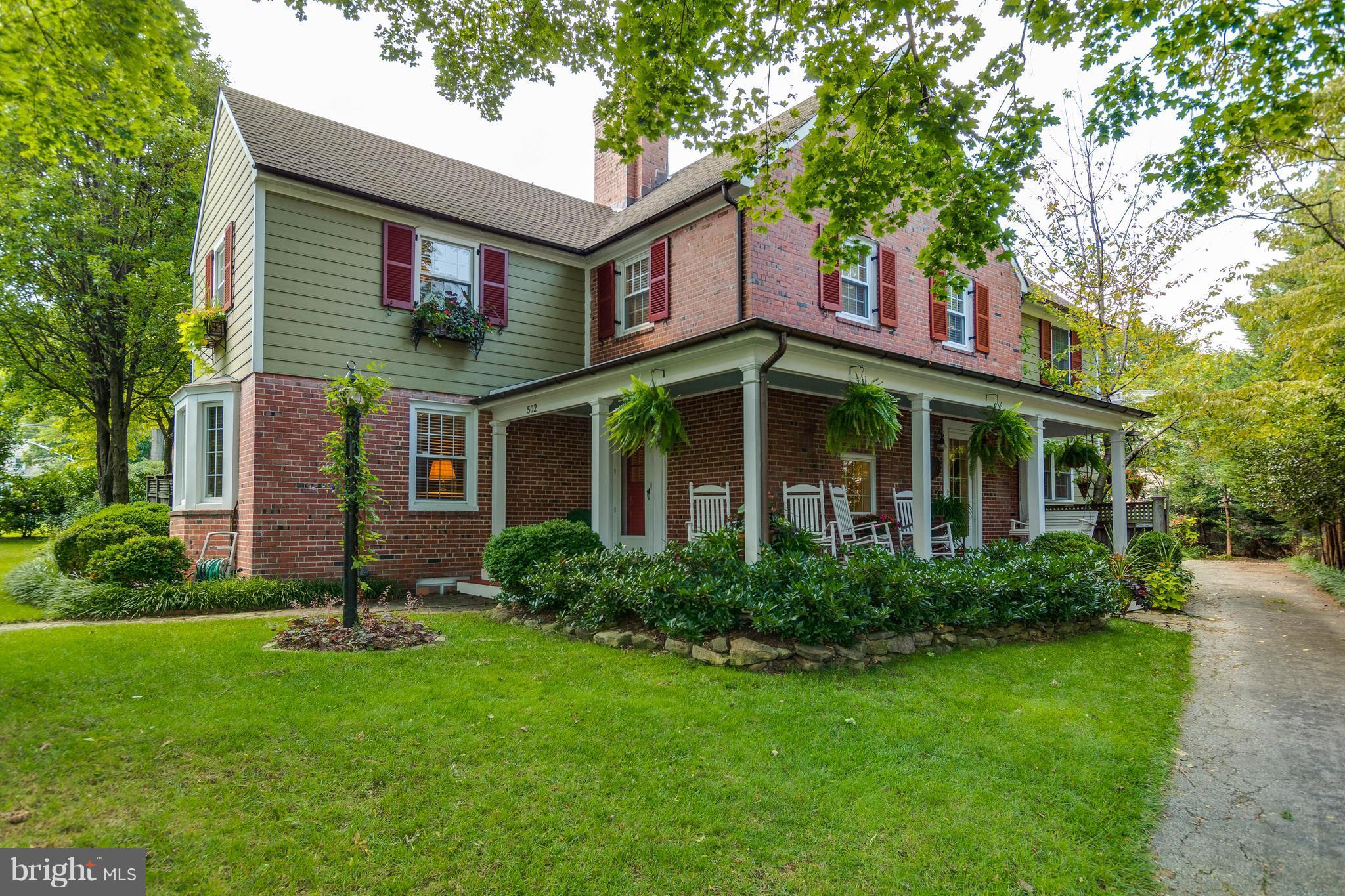 502 Worcester Road Towson, MD 21286 - Photo 1 of 30 a view of a house with a yard and potted plants