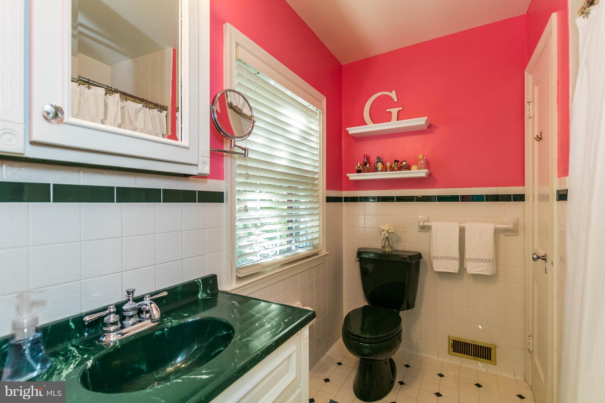 502 Worcester Road Towson, MD 21286 - Photo 18 of 30 a kitchen with a sink and a stove