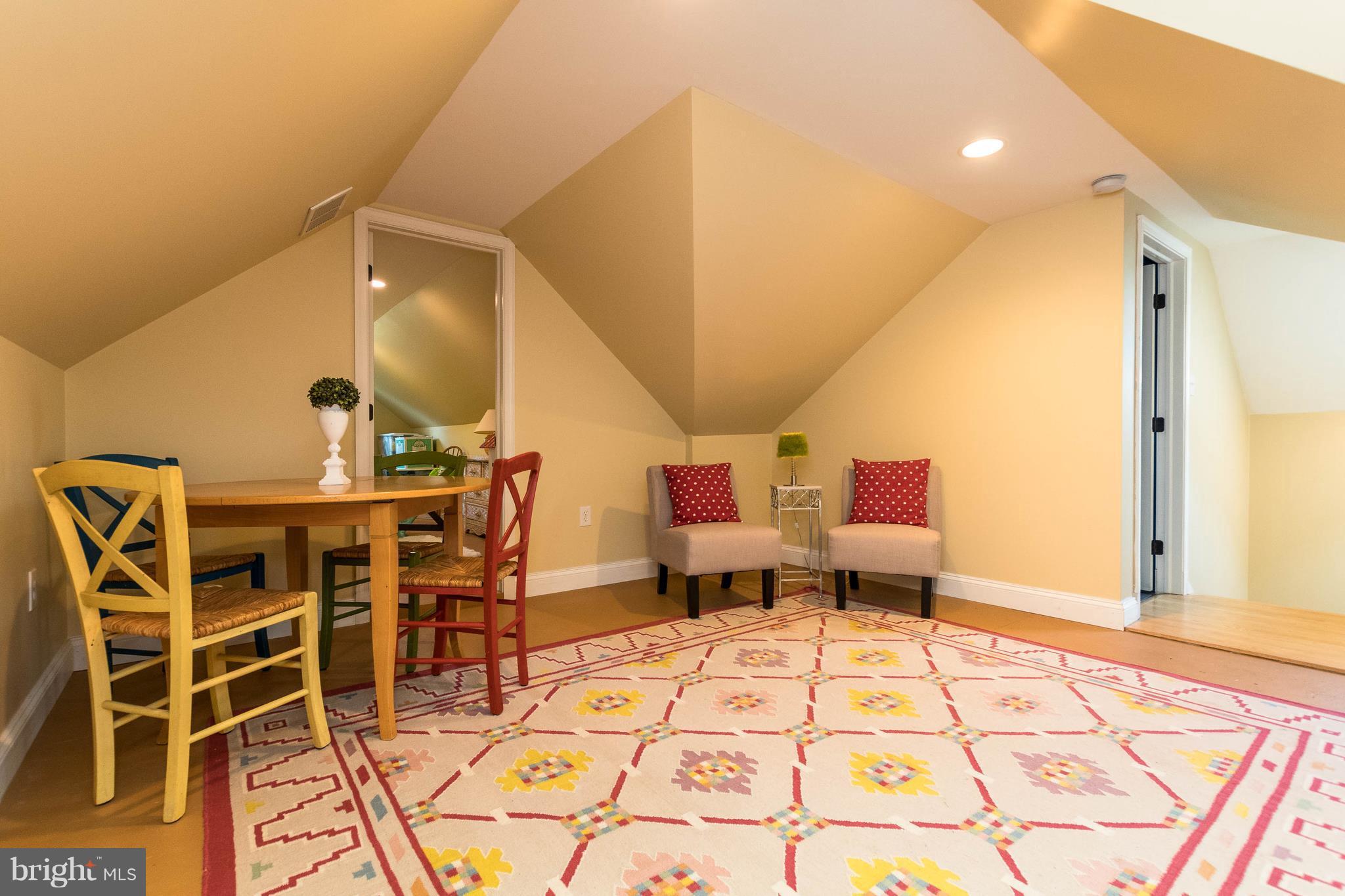 502 Worcester Road Towson, MD 21286 - Photo 22 of 30 a view of a dining room with furniture and wooden floor