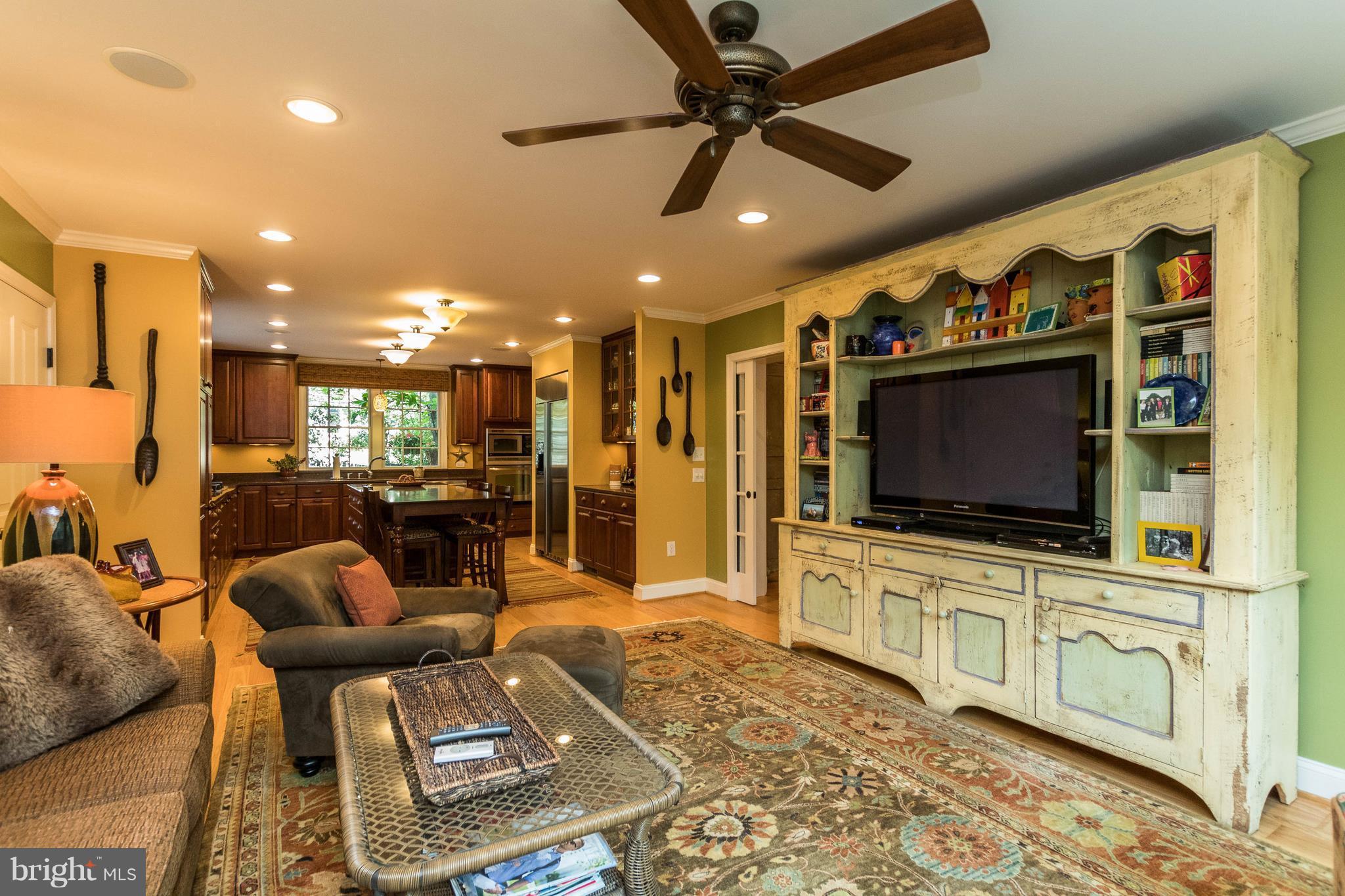 502 Worcester Road Towson, MD 21286 - Photo 7 of 30 a living room with furniture and a flat screen tv