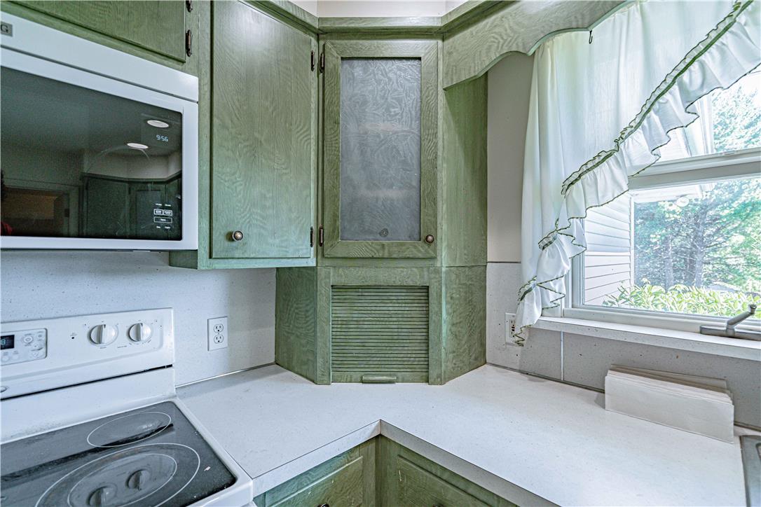 4815 Mill Road Schnecksville, PA 18078 - Photo 19 of 48 Prepare meals with ease in this well-appointed kitchen featuring generous countertop space and ample cabinetry.
