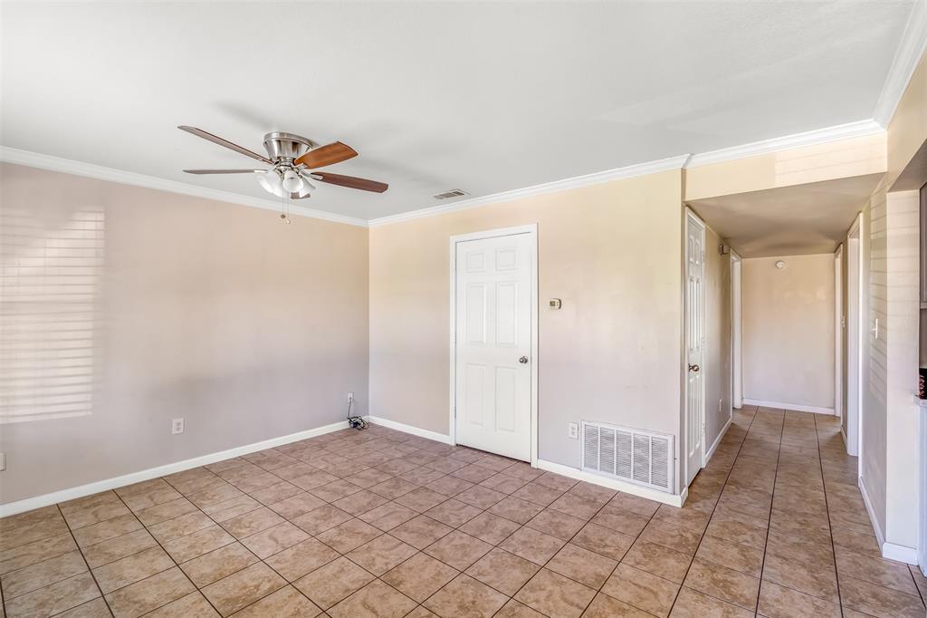 892 West Vanderbilt Street Stephenville, TX 76401 - Photo 9 of 34 a view of a livingroom with a flat screen tv