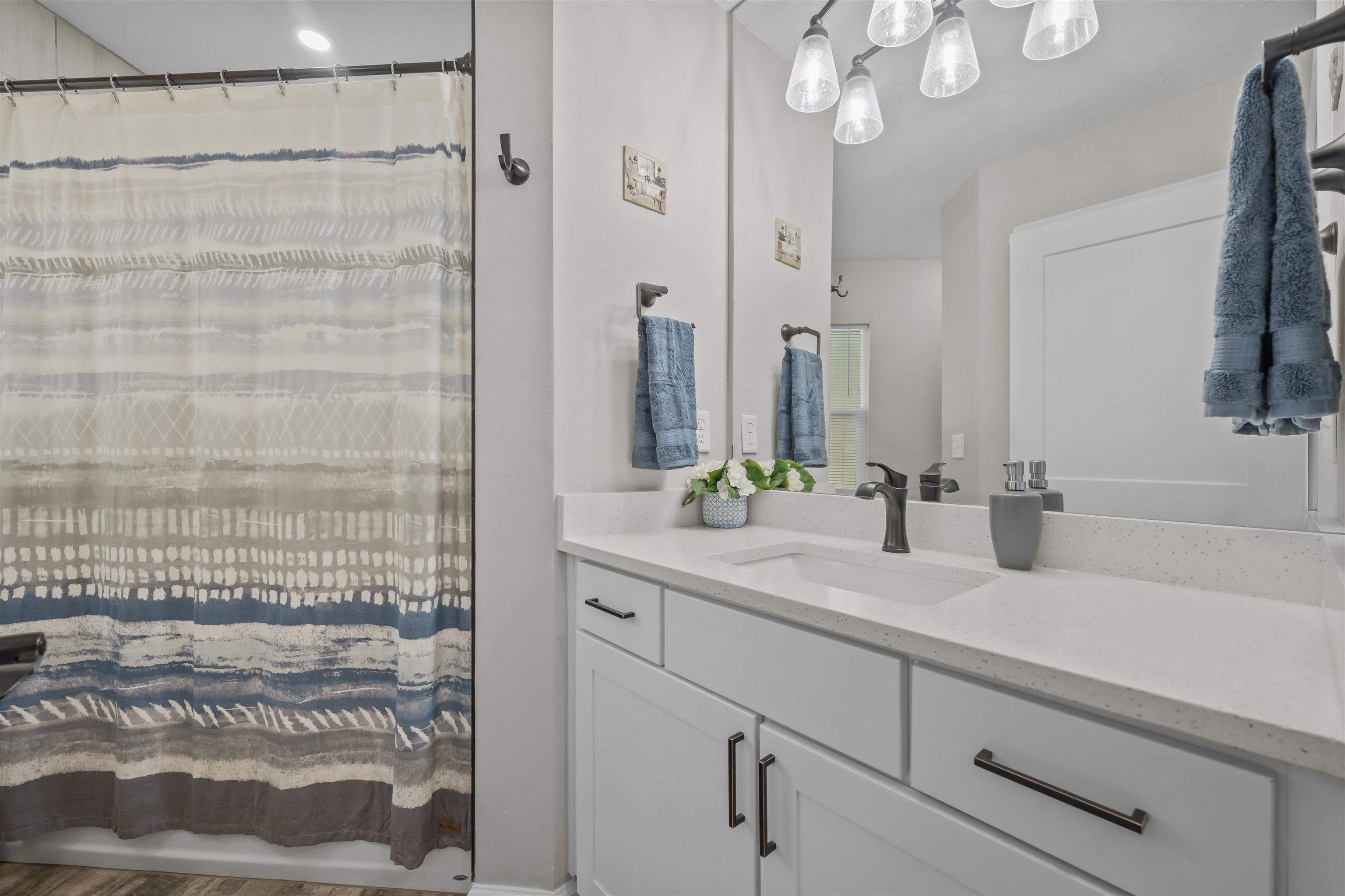 232 Kyte Road San Mateo, FL 32187 - Photo 24 of 36 Bathroom with vanity and wood finished floors