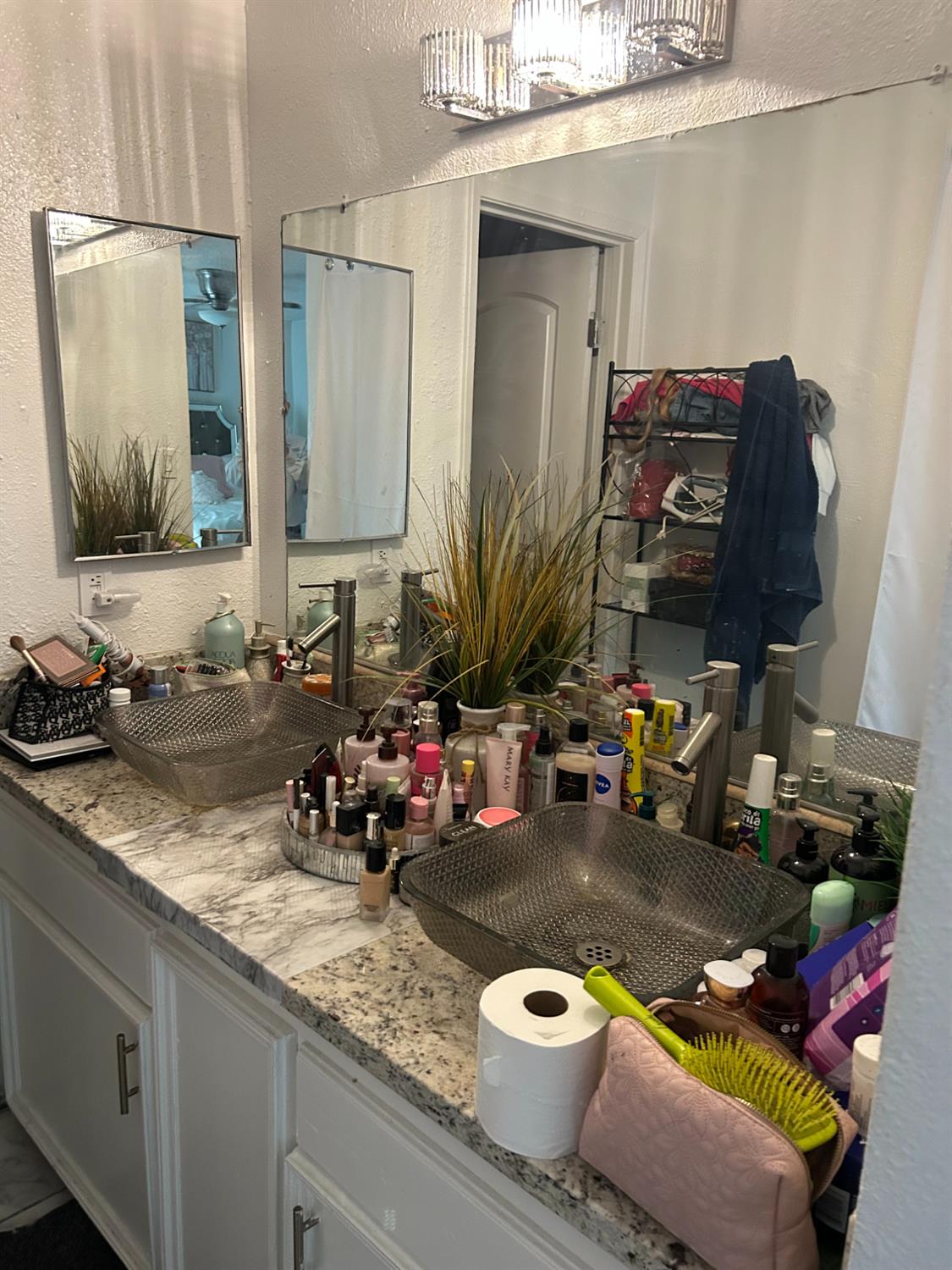 629 E Fort Modesto, CA 95354 - Photo 14 of 16 a bathroom with a granite countertop sink and a mirror