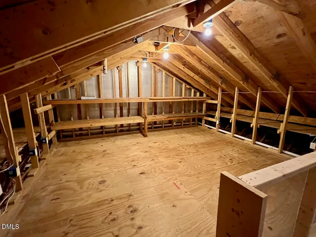 a view of a house with a wooden stairs