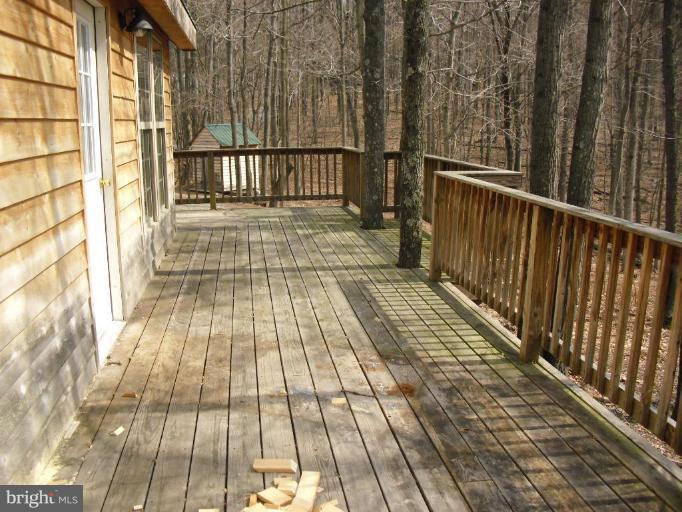 21 Riggs Lane Capon Bridge, WV 26711 - Photo 17 of 24 a view of balcony with wooden floor