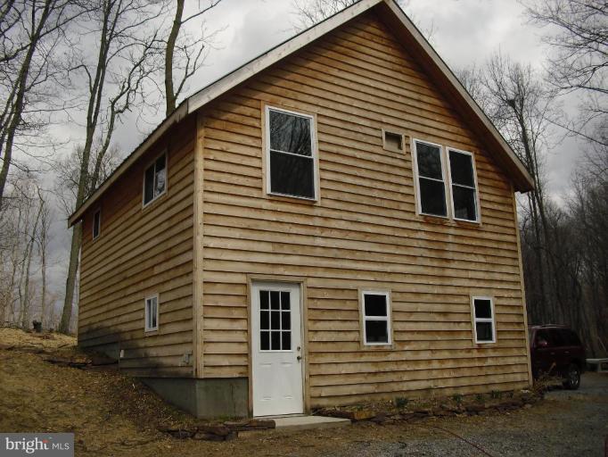 21 Riggs Lane Capon Bridge, WV 26711 - Photo 21 of 24 a view of a house