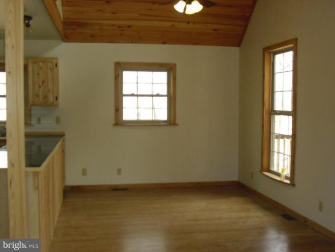 21 Riggs Lane Capon Bridge, WV 26711 - Photo 9 of 24 a view of an empty room with a window
