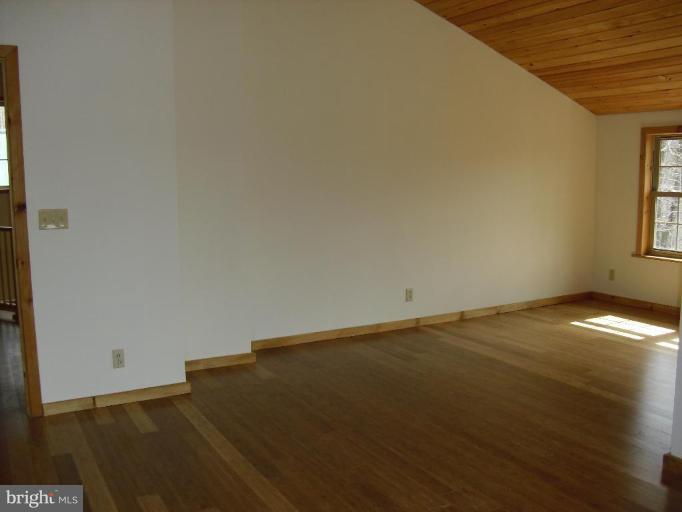 21 Riggs Lane Capon Bridge, WV 26711 - Photo 10 of 24 an empty room with a window