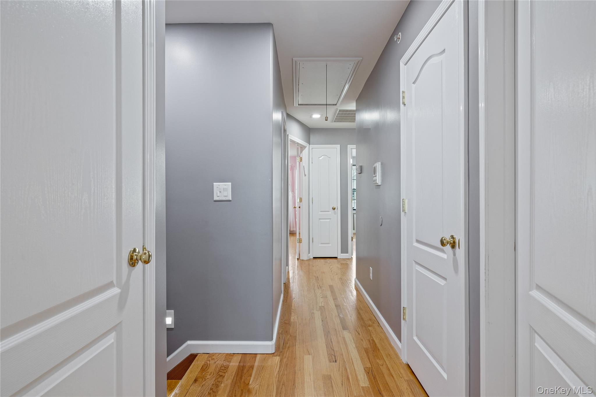 3314 Parkview Drive Spring Valley, NY 10977 - Photo 20 of 34 a view of a hallway with wooden floor and staircase
