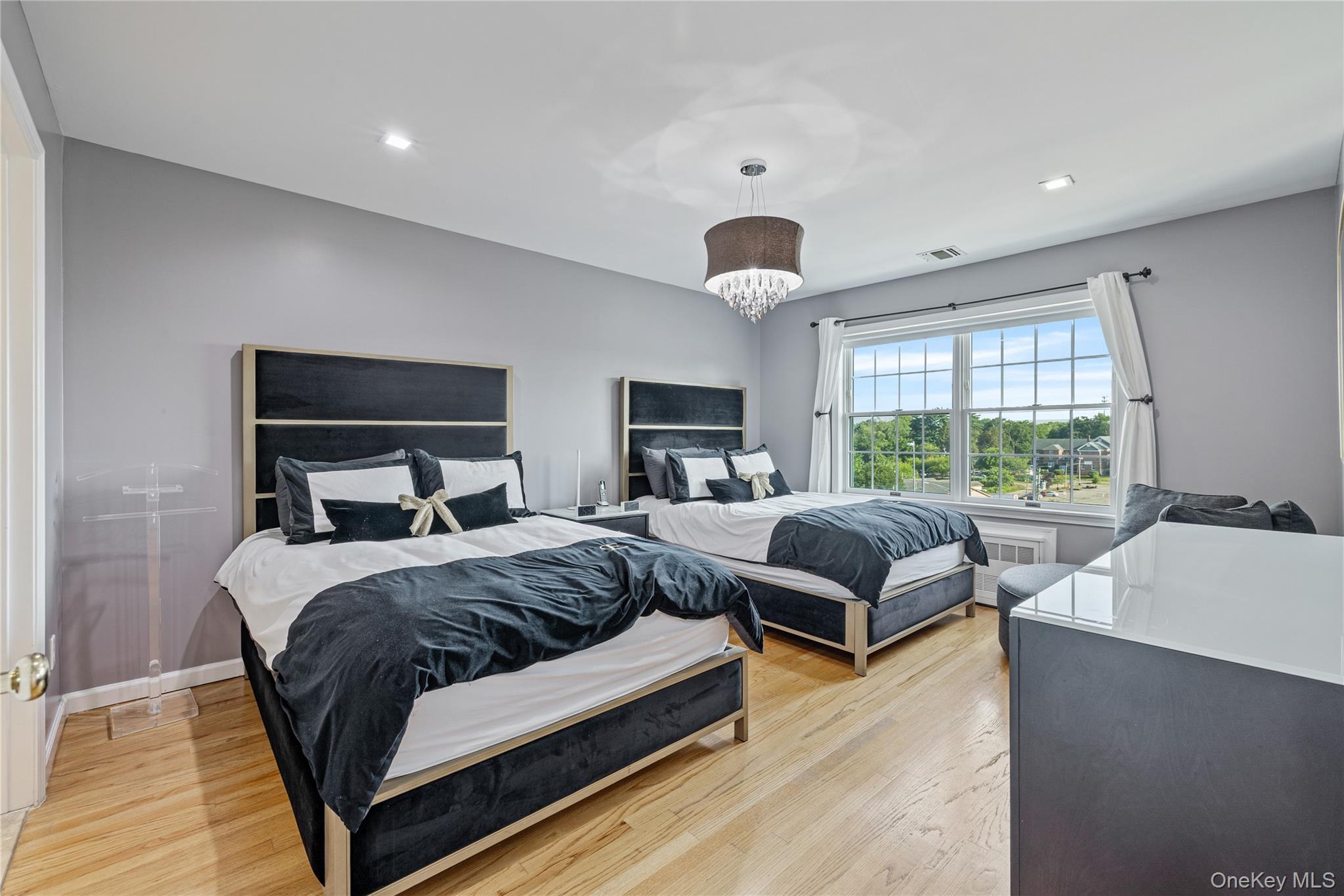 3314 Parkview Drive Spring Valley, NY 10977 - Photo 21 of 34 a spacious bedroom with a bed and window