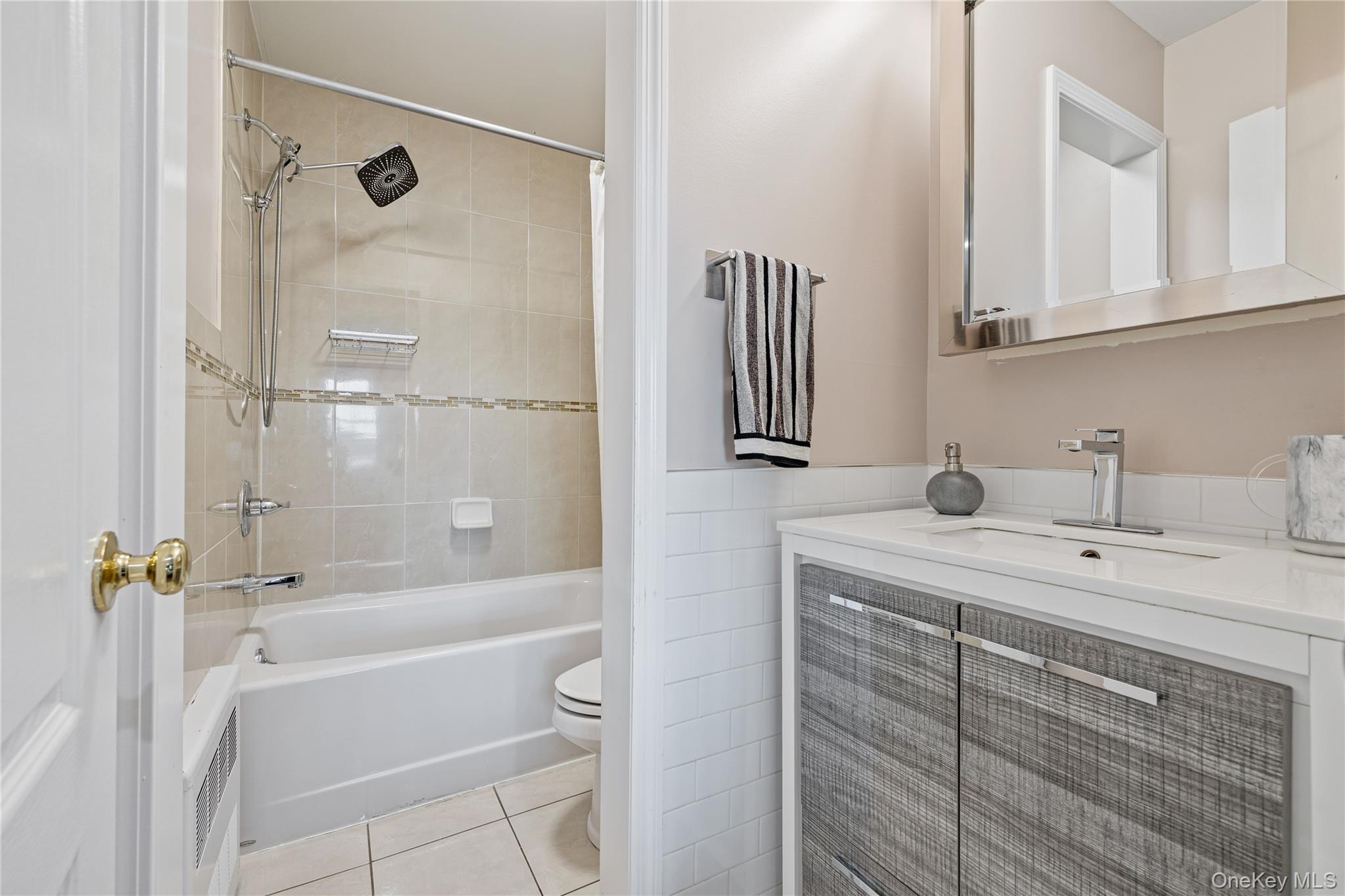 3314 Parkview Drive Spring Valley, NY 10977 - Photo 23 of 34 a bathroom with a tub sink and mirror