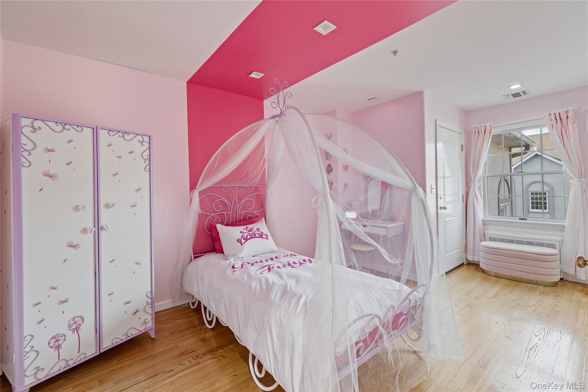 3314 Parkview Drive Spring Valley, NY 10977 - Photo 28 of 34 a bedroom with a bed and wooden floor