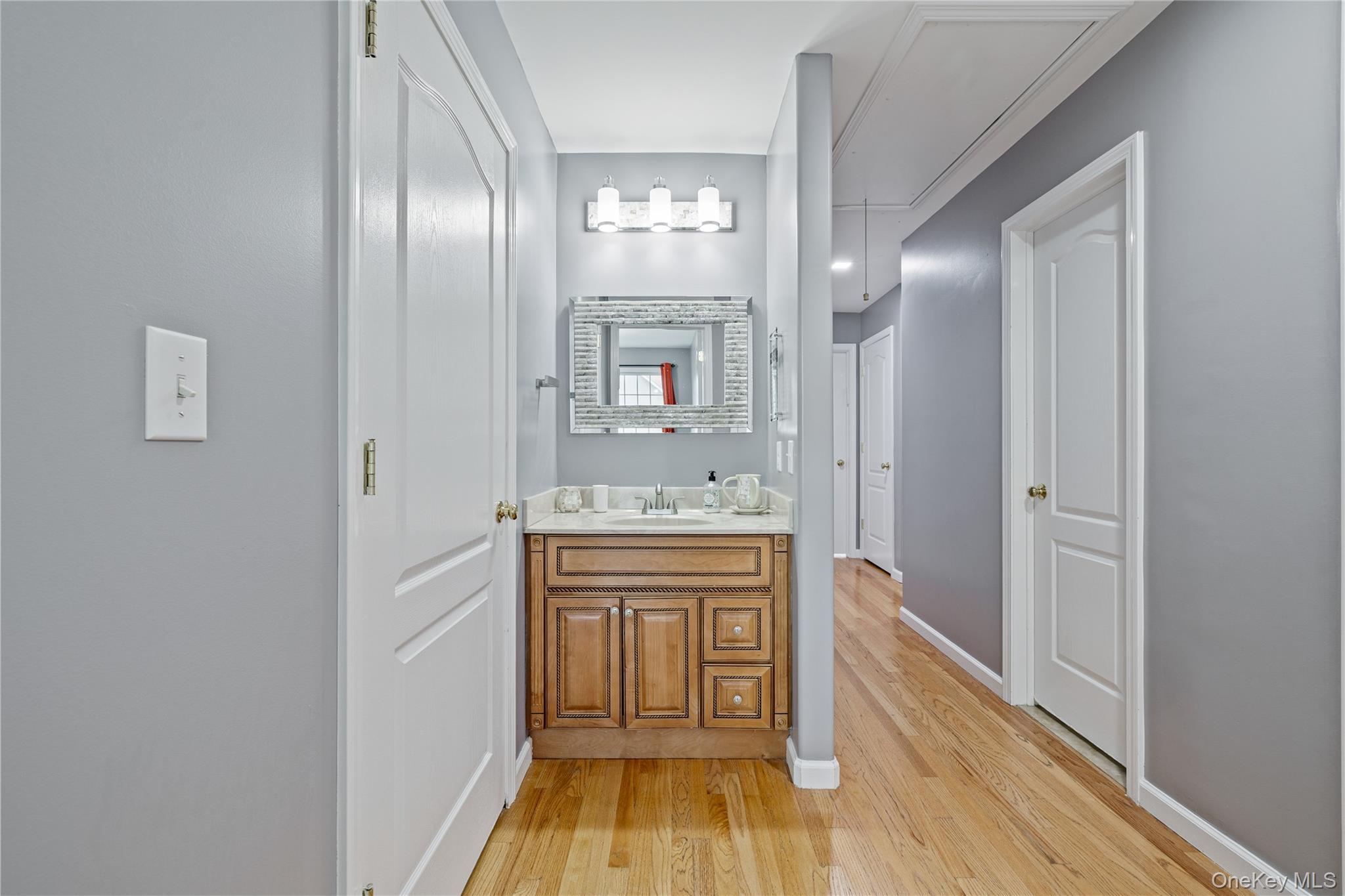 3314 Parkview Drive Spring Valley, NY 10977 - Photo 31 of 34 a bathroom with a sink and a mirror