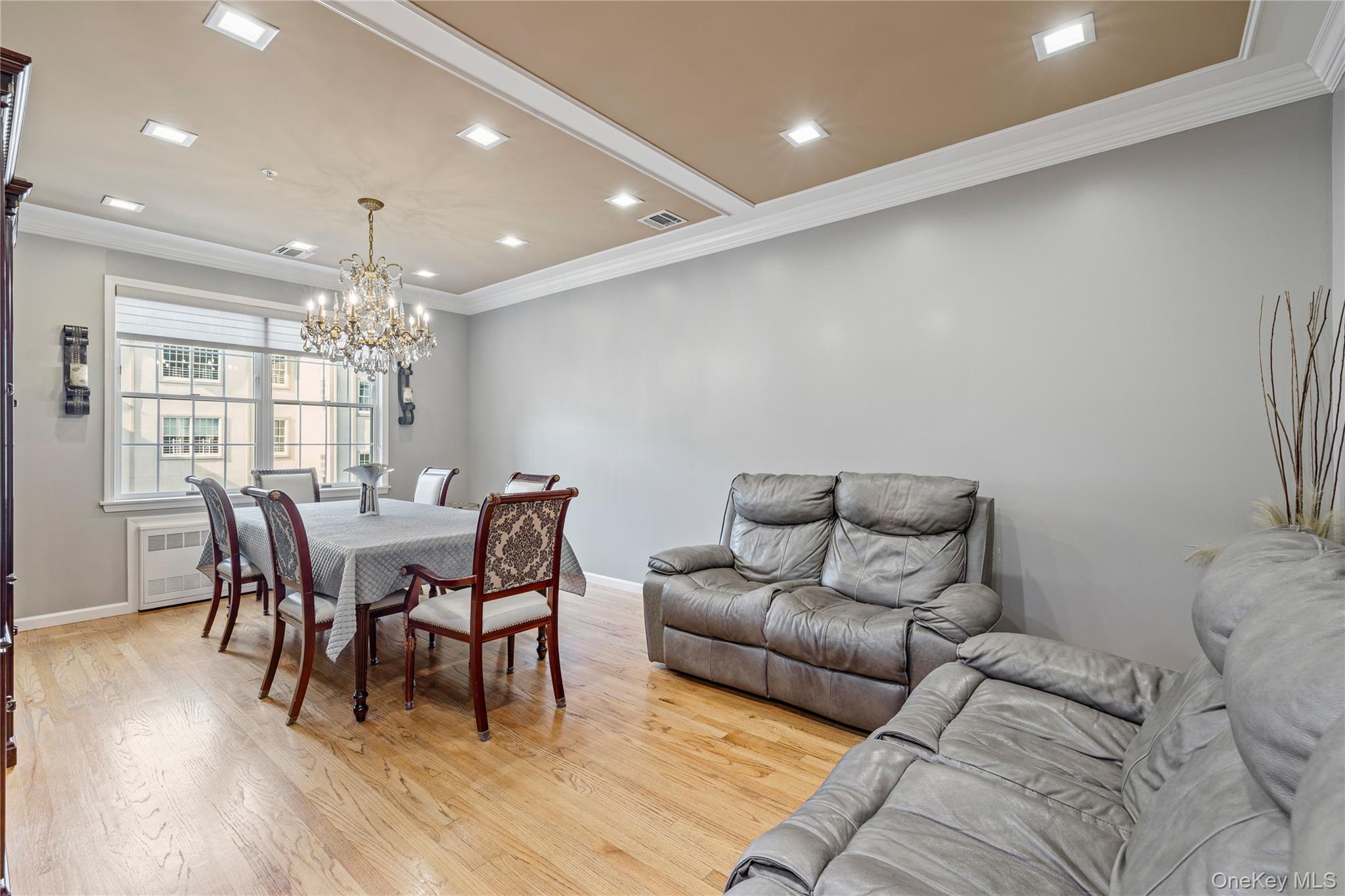 3314 Parkview Drive Spring Valley, NY 10977 - Photo 7 of 34 a living room with furniture and a chandelier