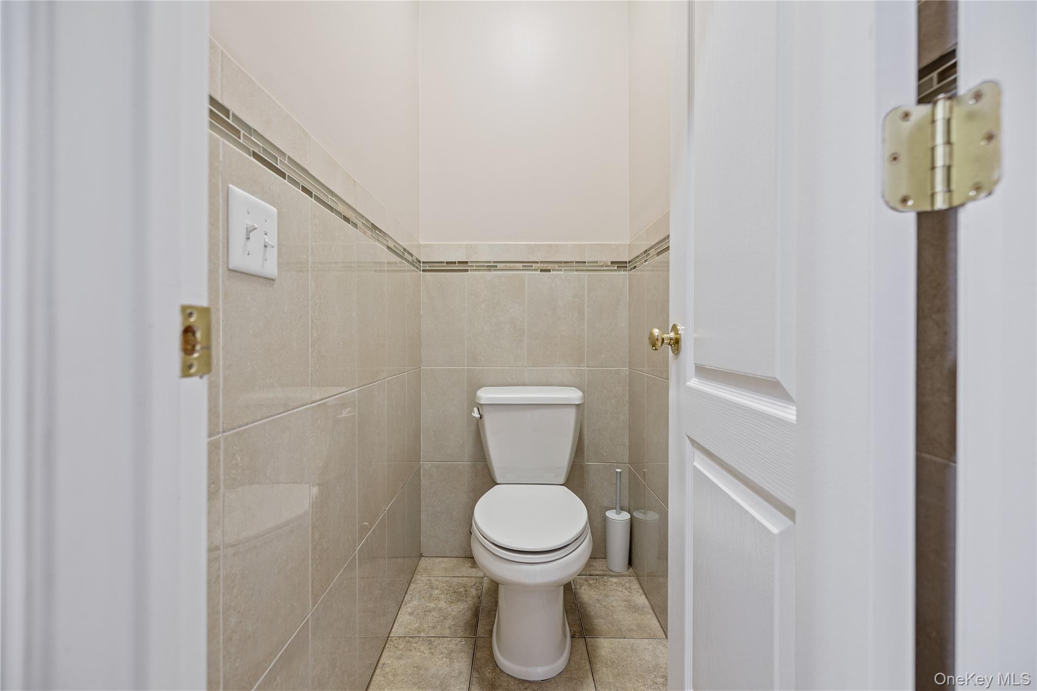 3314 Parkview Drive Spring Valley, NY 10977 - Photo 10 of 34 a bathroom with a toilet and a sink